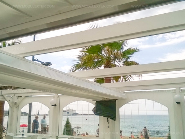 Pérgola de madera con toldo abierto Calonge