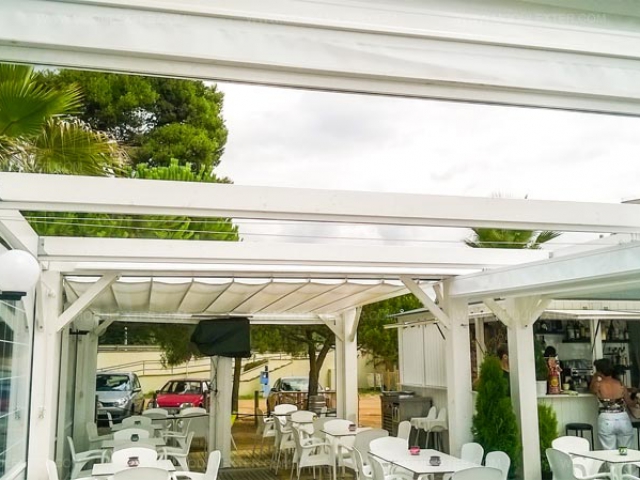 Pérgola de madera con toldo abierto cerrado Calonge